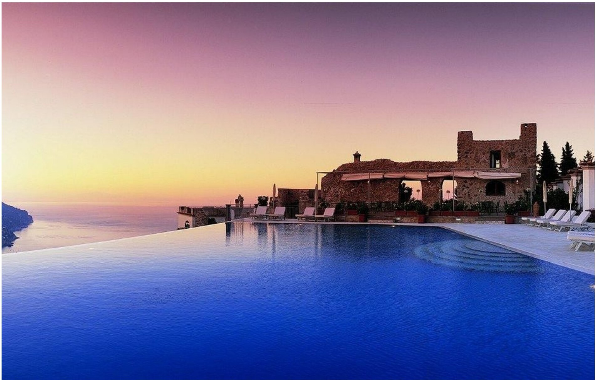 The infinity pool at Caruso at sunset overlooking the sea